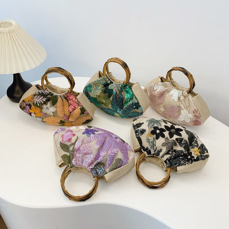 Dabel Embroidered Hand Bag - group shot of five colourways, multicoloured floral sequins (green, purple, pink, black, mixed) - Miss Mosa By Akanksha