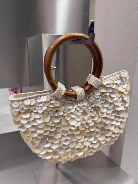 Daisy Sequin Hand Bag With Chain - three-quarter shot, ivory shell sequins with wooden ring handles - Miss Mosa By Akanksha