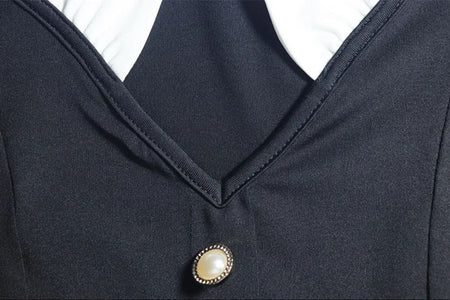 Debbie Buttoned Mini Dress In Black - close-up of neckline and pearl button - Miss Mosa By Akanksha
