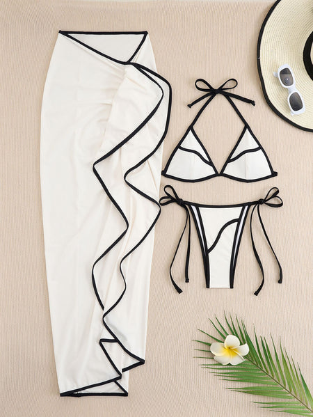 Delma 2 Pcs Swimsuit With Ruffle Skirt - flat-lay shot, cream with black trim - Miss Mosa By Akanksha
