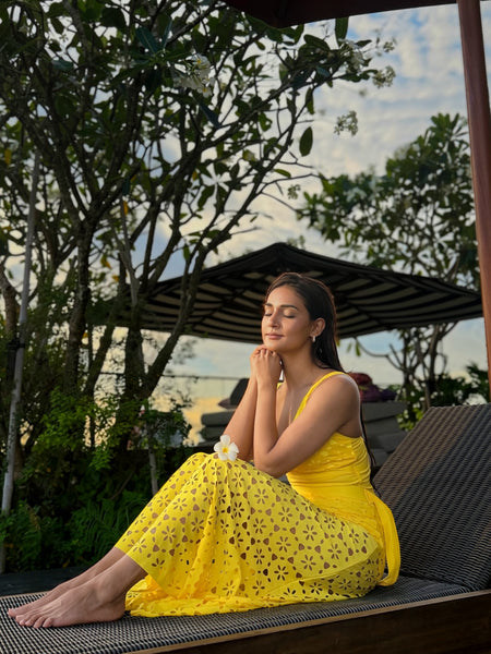 Delphina Cutout Swimsuit With Skirt - seated shot on model, yellow - Miss Mosa By Akanksha