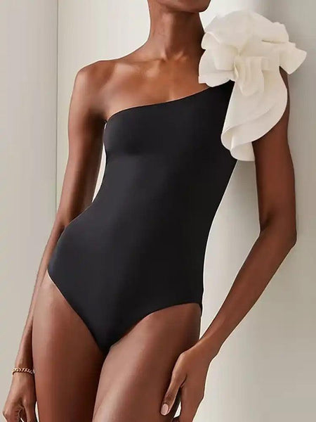 Delsa Rosette One Shoulder Swimsuit - front shot on model, black - Miss Mosa By Akanksha
