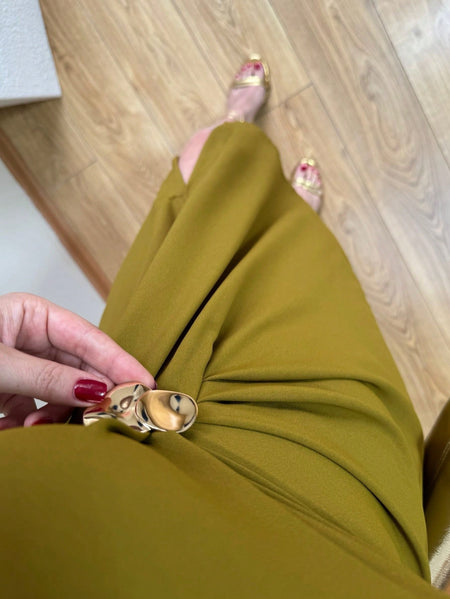 Desmia Luxe Slit Maxi Dress In Olive - close-up shot of leg slit and metal ring detail on model - Miss Mosa By Akanksha