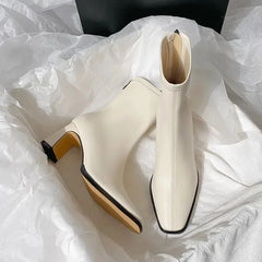 Desse Short Leather Statement Ankle Boots - styled flat-lay shot, cream - Miss Mosa By Akanksha