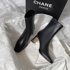 Desse Short Leather Statement Ankle Boots - styled flat-lay shot, black - Miss Mosa By Akanksha