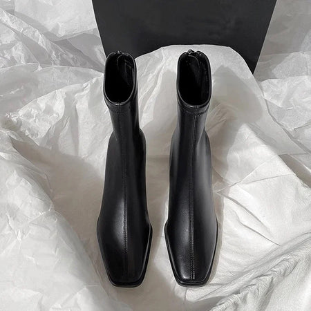 Desse Short Leather Statement Ankle Boots - flat-lay product shot, black - Miss Mosa By Akanksha