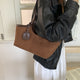 Dion Suede Tote Bag - shoulder-carry shot on model, brown - Miss Mosa By Akanksha