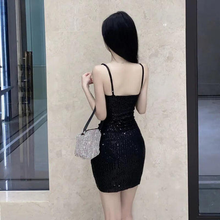 Dorota Sequinned Party Dress - back shot on model, black - Miss Mosa By Akanksha