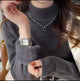 Dublo Fleece Lined Sweater - close-up of fur cuff on model, grey - Miss Mosa By Akanksha