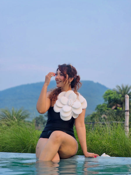 Dux Strapless Monokini In Black - seated shot on model - Miss Mosa By Akanksha