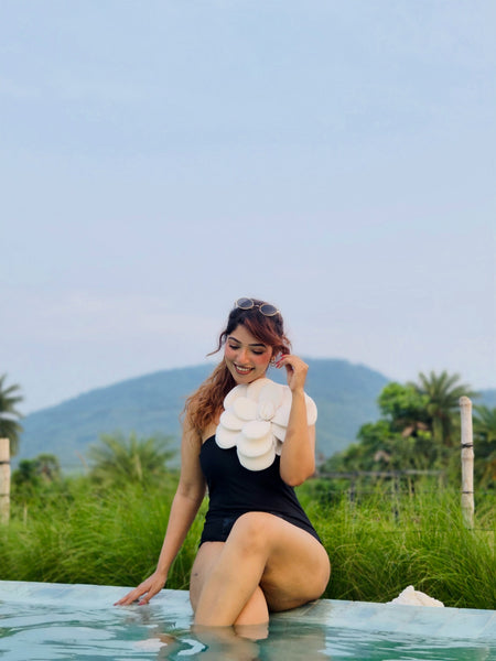 Dux Strapless Monokini In Black - seated shot on model - Miss Mosa By Akanksha