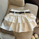 Effy Ruffle Polka Skorts With Belt - flat-lay shot, white with black polka dots and black belt - Miss Mosa By Akanksha