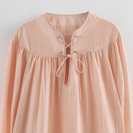 Elara Lace-Up Oversized Summer Top In Peach - close-up of lace-up neckline detail - Miss Mosa By Akanksha