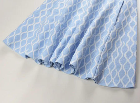 Elegant Luxe Short Knit Dress - close-up of pleated hem, light blue - Miss Mosa By Akanksha