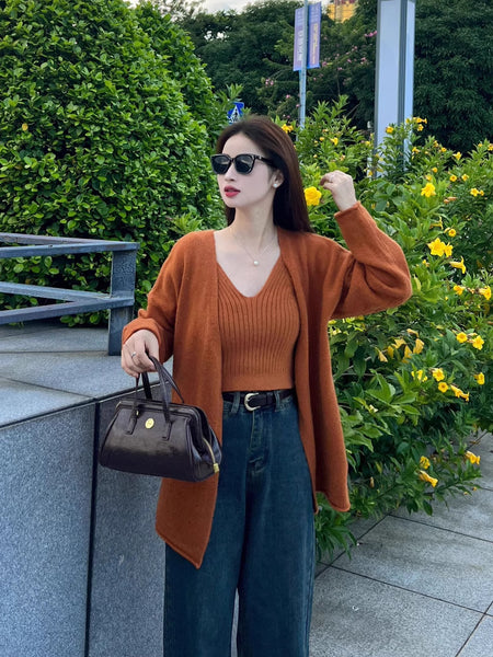 Elena Statement Woolen Tops with Cape Style Sweater - front shot on model outdoors, rust - Miss Mosa By Akanksha