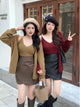 Elena Statement Woolen Tops with Cape Style Sweater - front shot on two models outdoors, khaki and red - Miss Mosa By Akanksha