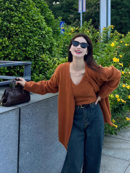 Elena Statement Woolen Tops with Cape Style Sweater - front shot on model outdoors, rust - Miss Mosa By Akanksha