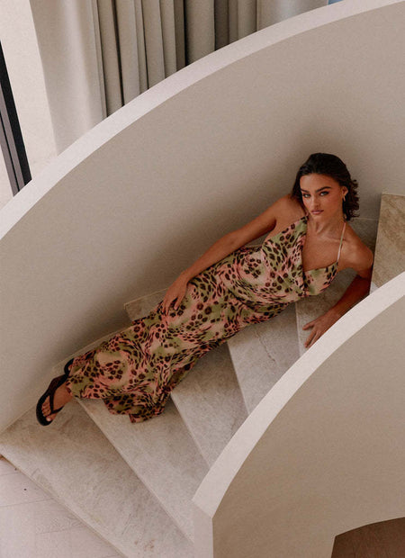 Eleni Halterneck Printed Maxi Dress - seated shot, green, pink and brown leopard print - Miss Mosa By Akanksha
