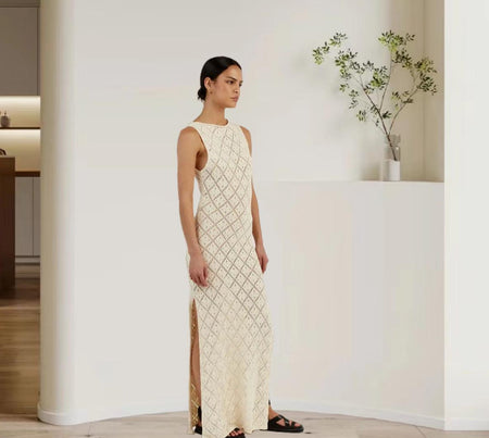 Ella Luxe Soft Knit Dress- Resortwear In Beige - side shot on model indoors - Miss Mosa By Akanksha