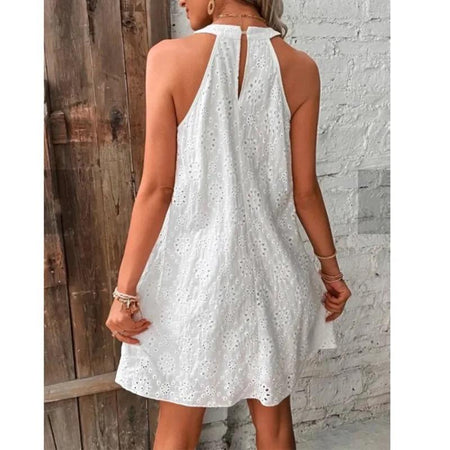 Elode Cotton Eyelet Summer Dress - back shot on model outdoors, white - Miss Mosa By Akanksha