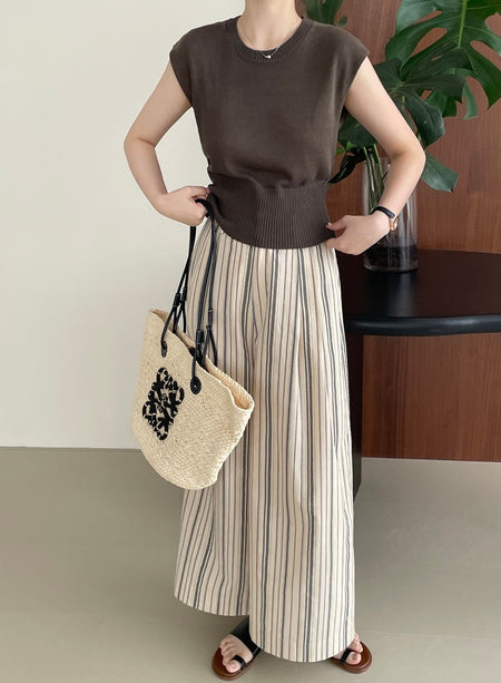 Elon Statement Striped Pants In Beige - full-length front shot on model with brown top - Miss Mosa By Akanksha
