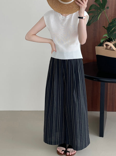 Elon Statement Striped Pants In Black - full-length front shot on model with beige top - Miss Mosa By Akanksha