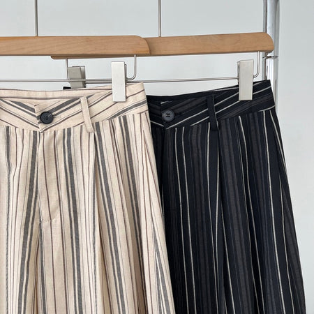 Elon Statement Striped Pants In Black - close-up shot of waistband and button detail of two colourways - Miss Mosa By Akanksha