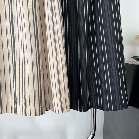 Elon Statement Striped Pants In Black - close-up shot of fabric hem of two colourways - Miss Mosa By Akanksha