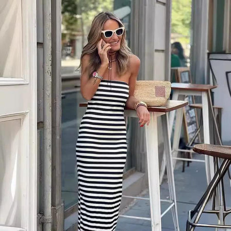 Emery Striped Offshoulder Dress In Black - full-length front shot on model outdoors - Miss Mosa By Akanksha