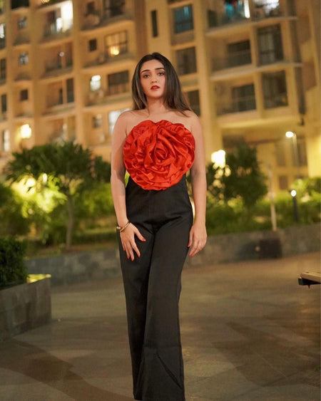 Emmy Off-Shoulder Jumpsuit In Red - lifestyle shot on model, black and red - Miss Mosa By Akanksha