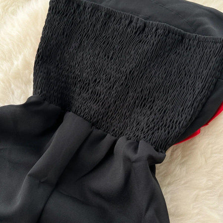 Emmy Off-Shoulder Jumpsuit In Red - close-up of smocked bodice, black - Miss Mosa By Akanksha