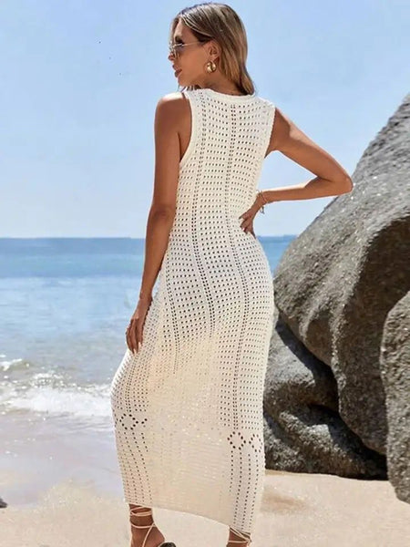 Enora Soft Crochet Dress - back shot on model on beach, cream - Miss Mosa By Akanksha
