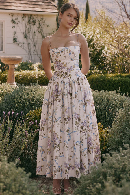 Eris Luxe Floral Maxi Dress In Off White - full-length front shot on model in garden - Miss Mosa By Akanksha