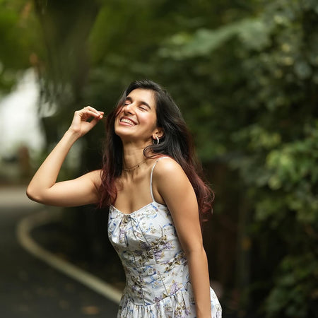 Eris Luxe Floral Maxi Dress In Off White - front shot on model outdoors - Miss Mosa By Akanksha