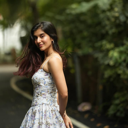 Eris Luxe Floral Maxi Dress In Off White - side shot on model outdoors - Miss Mosa By Akanksha