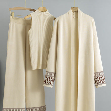 Esra Luxe Winter Coord Set With Cape - close-up of cardigan and top on hangers, off-white - Miss Mosa By Akanksha