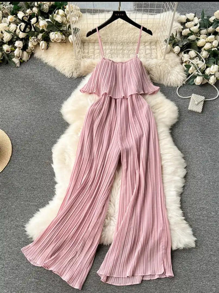 Flora Statement Jumpsuit In Pink - flat-lay product shot of the pleated jumpsuit on hanger - Miss Mosa By Akanksha