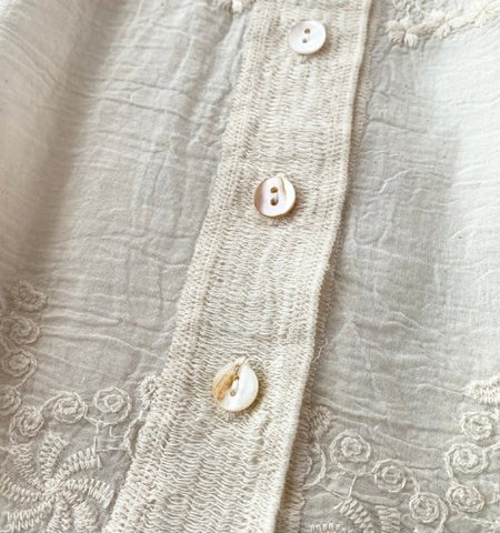 Fory Premium Embroidered Cotton Shirts In Beige - close-up flat-lay shot of the buttons and embroidery - Miss Mosa By Akanksha