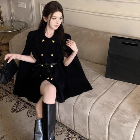 Gabrie Winter Cape With Belt - full-length shot on seated model, black - Miss Mosa By Akanksha