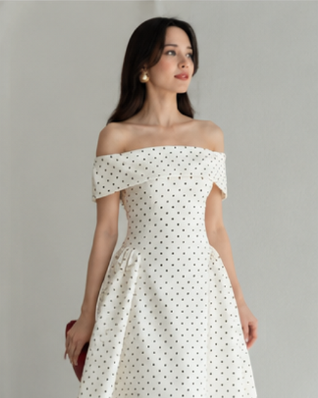 Giulia Drop Waist Polka Midi Dress - three-quarter shot, cream with black polka dots - Miss Mosa By Akanksha