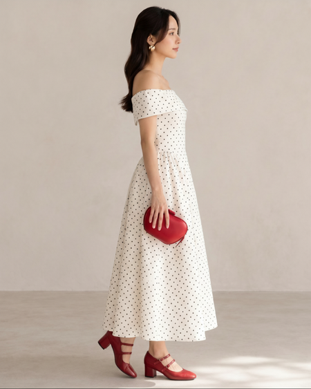 Giulia Drop Waist Polka Midi Dress - side shot, cream with black polka dots - Miss Mosa By Akanksha