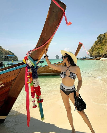 Giza Swimsuit with Sarong Skirt In Black - lifestyle shot on model, black - Miss Mosa By Akanksha