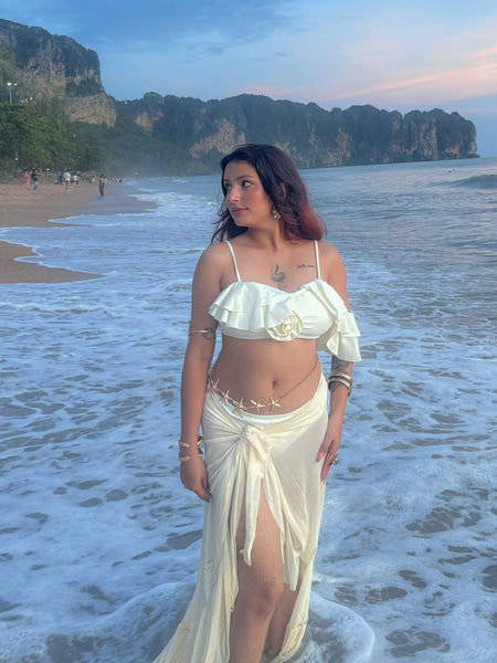 Hannah Swimsuit with Sarong Skirt - front shot on model on beach, cream - Miss Mosa By Akanksha