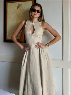 Harlow Statement Dropwaist Midi Dress - front shot on model indoors, beige - Miss Mosa By Akanksha