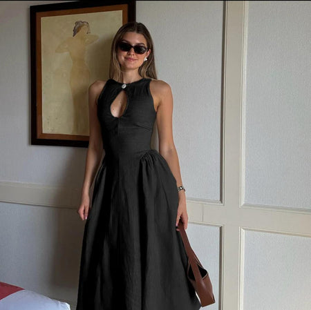 Harlow Statement Dropwaist Midi Dress - front shot on model indoors, black - Miss Mosa By Akanksha
