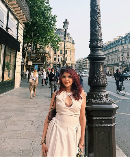 Harlow Statement Dropwaist Midi Dress - front shot on model on a street, cream - Miss Mosa By Akanksha