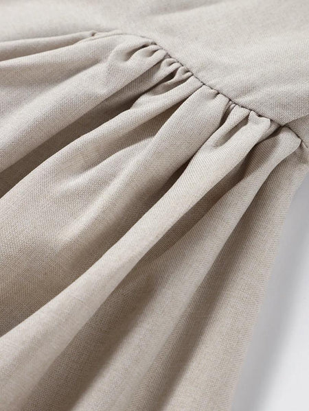 Harlow Statement Dropwaist Midi Dress - close-up shot of the gathered waist fabric, beige - Miss Mosa By Akanksha