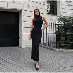 Hastor Luxe Soft Knit Dress - full-length shot on model, black - Miss Mosa By Akanksha