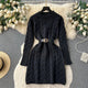Heathrow Statement Knitted Dress with Belt - front shot on hanger, black - Miss Mosa By Akanksha