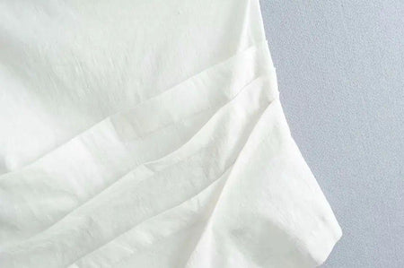 Helina One Shoulder Top In White - close-up of fabric, white - Miss Mosa By Akanksha